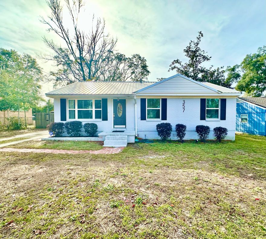 This beautifully updated single-story home offers the perfect blend of both comfort & style. As you enter, you'll immediately notice the modern finishes throughout. The open concept floor plan seamlessly connects the dining, kitchen & living areas, creating a spacious & inviting atmosphere for entertaining! The kitchen is a chef's delight, featuring sleek countertops, stainless steel appliances, ample cabinet space & a convenient center island. Whether you're hosting a dinner party or preparing a meal for your loved ones, this kitchen is sure to impress. The bedrooms are generously sized & offer plenty of natural light, creating a warm & cozy ambiance. The master suite is a true retreat, complete w/ a en-suite bathroom & a walk-in closet. One of the highlights of this property is the