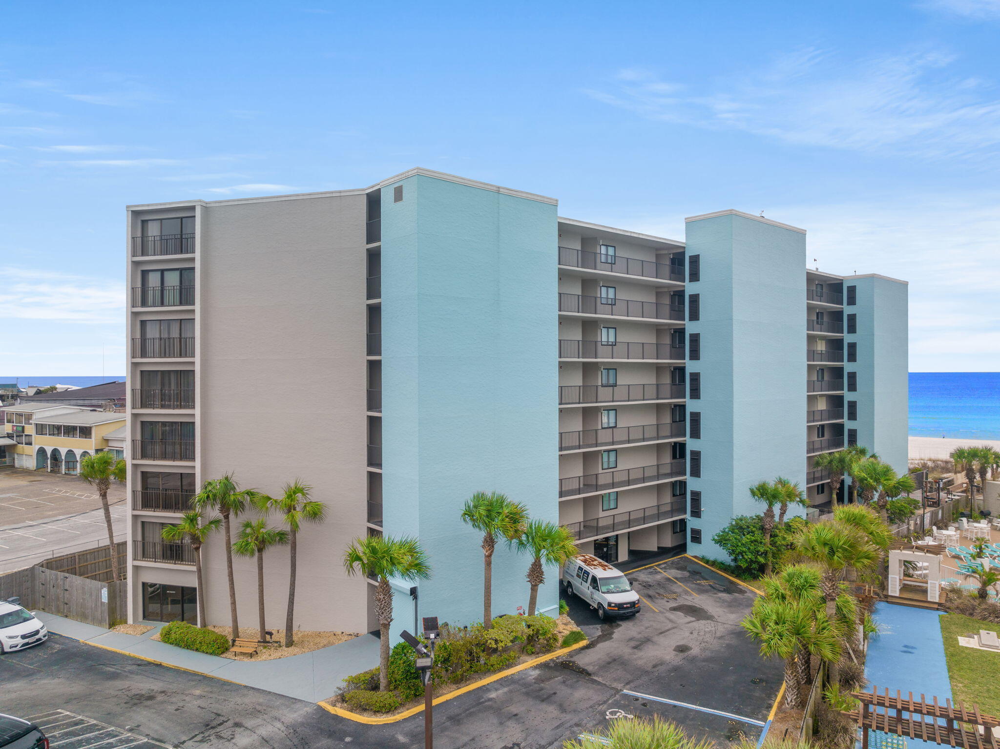 Welcome to Moondrifter, a cozy condo complex, nestled on Thomas Dr., just a short walk from popular attractions and nearby local restaurants. This convenient 3rd floor unit is beachfront, featuring a spacious private balcony where you can enjoy breathtaking morning sunrises and unforgettable evening sunsets. This 2 bedroom/2 bath unit boasts tons of upgrades! The big-ticket items have been replaced, including a brand-new AC in 2022 and a new hot water heater in 2023. Additional highlights include a new shower remodel, new sink and vanity in the bathroom and new flooring in the living room. The unit also features its own private extra storage room across the hall. The condo is tastefully decorated with a relaxed coastal beach vibe that features a large open floor plan, queen sleeper sofa in the living room, extended dining area and breakfast bar off of the kitchen. The master bedroom features a king bed and private en suite. The spacious 2nd bedroom hosts a queen bed and plenty of closet space. There is also an additional owner's closet that could be converted into hall bunk beds. Owner will give flooring allowance for both bedrooms with an acceptable offer. Amenities include an inground community pool, tennis courts and shuffleboard. At this time there are NO current or upcoming assessments, and the building has passed the recent fire and safety inspections. Centrally located in the heart of Panama City Beach, this is one to put on the top of your list. Call your favorite Realtor to schedule a showing!
