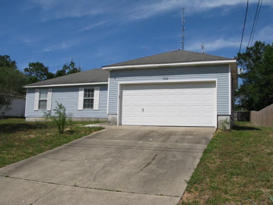 Don't miss this one. Updated. Stainless appliances. New wood finish flooring throughout. Ready to move in. Large Fenced Yard. 2 car garage. This one sparkles!