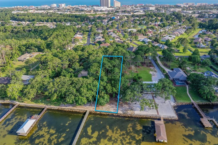 Bay front lot with 100' of waterfront! Situated directly on the calming waters of the Choctawhatchee Bay. Just minutes away from Silver Sands Outlet Mall, Sandestin Resort, and all the amenities of the Emerald Coast.