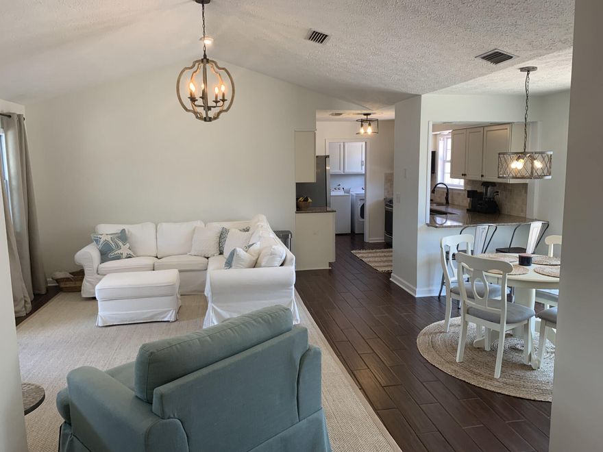 Beautiful 3 bed / 2 bath home in Open Sands with no HOA! Just two blocks to the beach in a golf cart friendly, and no short term rental community. It's so quiet with friendly neighbors! The home features tile floors, granite countertops and a spacious yard with room for a pool. The home has recently undergone an extensive renovation and is move in ready. We are willing to sell the furnishings if you like them! Public Beach Access 51 is a favorite with the convenient golf cart parking , Runaway Island Restaurant and Alvin Island and Express Lane for all the beaching conveniences. Buyer to verify all information deemed important.