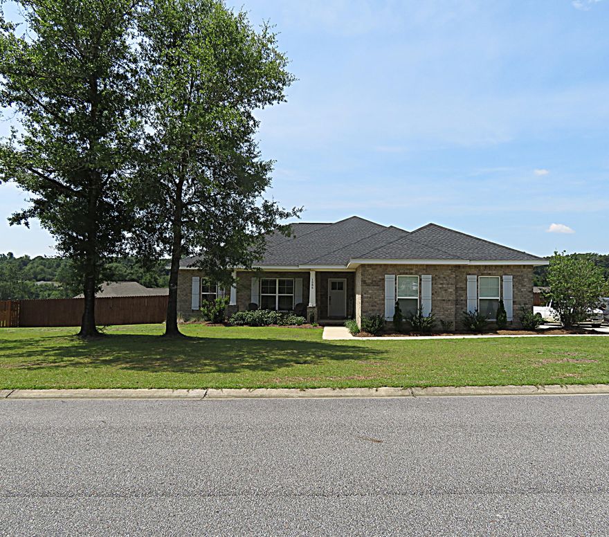 This stunning 4 bedroom, 3 full bath home with solar panels is minutes from downtown Crestview and has easy access to highways. It offers countless upgrades to include stainless steel appliances, 6 inch base boards, 6 inch crown molding, recessed ceilings with can lighting, quartz countertops, under cabinet lighting and soft close cabinets. The split floorplan provides added privacy for your master suit which is equipped with double vanities, a large walk in closet, separate water closet, oversized walk in shower. The second master bedroom is a convenient option for guests, adding comfort and privacy to their experience. Sitting on a half acre lot, this home offers an extended driveway and has plenty of room for additional parking. Don't miss the opportunity to call this home!