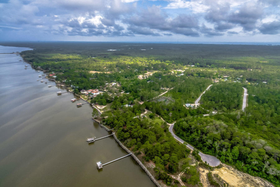 Steps from the Bay!! LARGEST PARCELS NEXT TO THE BAY!! Rare Find! See Attached Drone Footage! Build you own Dream Home steps away from Choctawhatchee Bay and enjoy community Boat Dock! This gated community of Seclusion Bay offers 53 estate-size lots with 15 acres dedicated to preservation. The lots range in size from .5 acres to 1.5 acres. This community is located within minutes to the beaches of 30A, shopping and dining as well as a short drive to Sandestin Golf and Beach Resort, Grand Boulevard and Sacred Heart Hospital. Buyer to verify all fees and lot dimensions. NEW DOCK is being built.https://www.dropbox.com/s/c6kprx80jw86ite/Seclusion%20Bay%20MLS.mov?dl=0