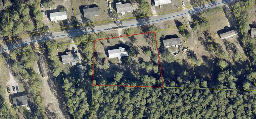 Fully fenced, almost full acre lot with water tap fee paid, septic tank and power in place. Vacant mobile home on property needs to be removed.