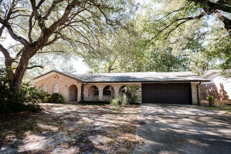 Solid brick vintage home. One time owner never offered on the market before.  Bring your sketch pad and start imagining how you can make this your home. The laundry is inside with large storage closet that can be used as a pantry. The master bedroom is off the family room.  All brick fireplace with built-in shelving surrounding it.  Additionally there is another living area and a formal dining area. Beautiful lot with mature trees.  Plenty of room for outdoor living.  The roof was replaced 2014, garage door in 2016, and garage door opener in 2016.  The water heater is 1997 and the HVAC is 2002. The garage has extra room at the front for storage or a small workshop area.