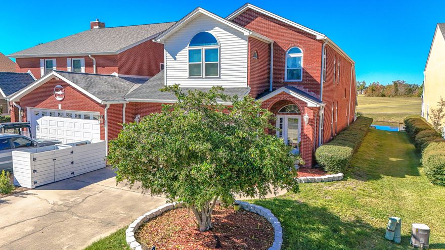 This spacious and stately 3 bedroom 2.5 bath duplex offers the perfect blend of elegance, comfort and location - nestled along the 6th hold of the Panama Country Club golf course.  Perfect for the golf enthusiast, this home provides beautiful fairway views and access to a vibrant, golf cart-friendly community.  Featuring a large first floor master suite with newly renovated large walk-in closet and updated bathroom.  Enjoy water views of the bayou across the street, or relax in the newly renovated screened back porch and deck overlooking a peaceful pond.  The large, open kitchen boasts stainless appliances, granite countertops and a layout that flows seamlessly into the living area - ideal for entertaining.  Additional highlights include a 2 car garage, sidewalks to parks and shopping.