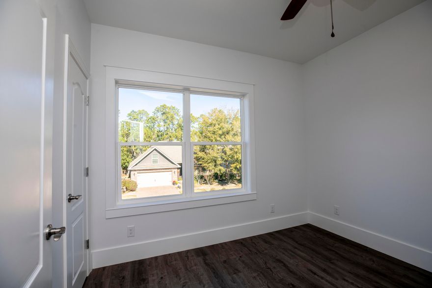 This custom built home offer 3 bedrooms and 2.5 bathrooms in the main house and another bedroom, kitchen full bathroom and living area in the mother in law suite.  Offered with granite counter and bathroom vanity tops, this home located just a short walk to to the bay and a 5 minute drive to the beaches of South Walton.  The home offers and office as well as a 300 square foot heated and cooled area for storage or a game room.  Sprinkler system is in place for your lawn as well.