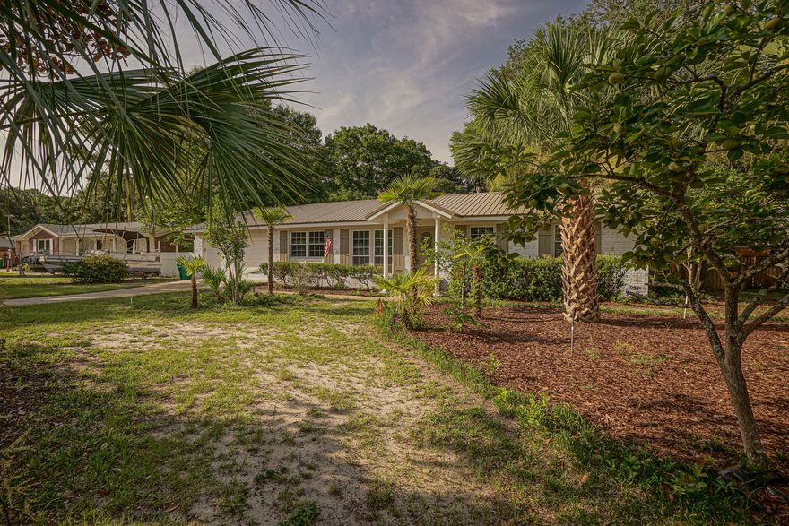 **Copper Wiring **This home has something for everyone. 3 living areas, 3 bedrooms, 2 bath and all renovated. Enough room to park a motor home or boat or both in backyard. A workshop/garage in backyard along with another small storage unit and covered picnic shelter with gas cooktop. In addition, the neighborhood offers a waterfront park/boat launch and elementary school where kids can walk to school. A walk-in pantry in the new kitchen featuring new -in white cabinets, new granite counter tops, new Stainless Steel Appliances, lighting, faucets, etc. All new flooring throughout the home with Luxury Vinyl Wood flooring in living ares including kitchen and carpeting in bedrooms. Come by today and view this home.