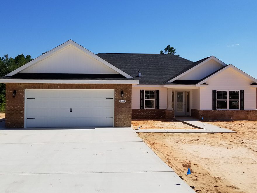 NEW BUILD IN THE PRESERVE IN MILTON! CLOSING COSTS PAID BY THE BUILDER USING ONE OF FIVE PREFERRED LENDERS-Wide open floor plan with 10 foot ceilings-stainless steel appliances and granite counter tops in kitchen-covered front porch and lanai-large master suite with dual vanities, garden tub and separate shower-ceiling fans -low E tilt in windows for easy cleaning--sodded front, side and back yards with sprinkler system featuring Rain Bird sensor and automatic timer-half acre lot. The Preserve is convenient to I10, less than 30 minutes to Navarre Beaches, downtown Pensacola and the Cordova Mall.
All lots in The Preserve are on public water and sewer, NO SEPTIC TANKS, and there is plenty of room in the back yard to put a pool, shed or workshop or to store your RV, boat and other toys. C