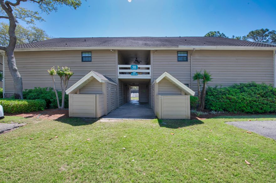 One of a kind find,  3BR / 2 ba Golf Villa in Seascape Golf, Tennis & Beach Resort. First floor unit has been renovated within the past few years.  Both bathrooms were updated in 2019 with plank tiled flooring and subway tile bath surrounds along with a new HVAC in 2019 with upgraded electrical panel.  Newly installed carpet in the l/r, granite countertops in kitchen and new cabinets with-in the past few years. The refrigerator & dishwasher were replaced in 2020.  The patio doors opens to a covered porch and just steps to one  of the community pools and tennis courts.  Relax on the porch enjoy the swing  after a day in the sun.   Outside storage for personal items and a washer / dryer in the breezeway for convenience.  Future bookings throughout the summer season.   Enjoy the amenities at Seascape:  2000' of deeded beach, 18 hole golf course, pro shop, 5 pools, tennis courts, fresh water lakes, RV & boat storage, conference center, and the Whale's Tail Restaurant on the beach.