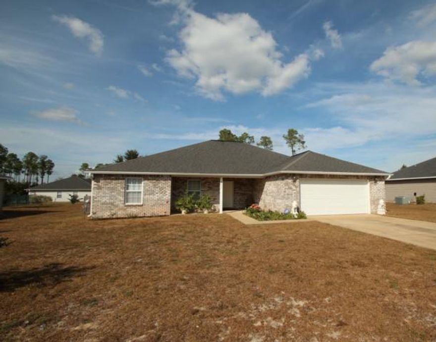 One of the nicest most well maintained four bedroom homes you will find in this price range!!! Very open split bedroom floor plan. Not a spec of carpeting anywhere! All beautiful wood laminate flooring with tile in laundry room and baths!! Large kitchen is centrally located and overlooks the spacious great room. There is a roomy dining area as well as a breakfast bar. Nice inside utility room and convenient pantry (see photos). You won't BELIEVE the size of the secondary bedrooms. Usually in a four bedroom home they are not that large but these are so spacious!! The master suite is wonderful--large bedroom and a huge master bath with garden tub and separate shower. All of the doors and halls in the home are extra wide and handicapped accessible. Privacy fenced back yard.