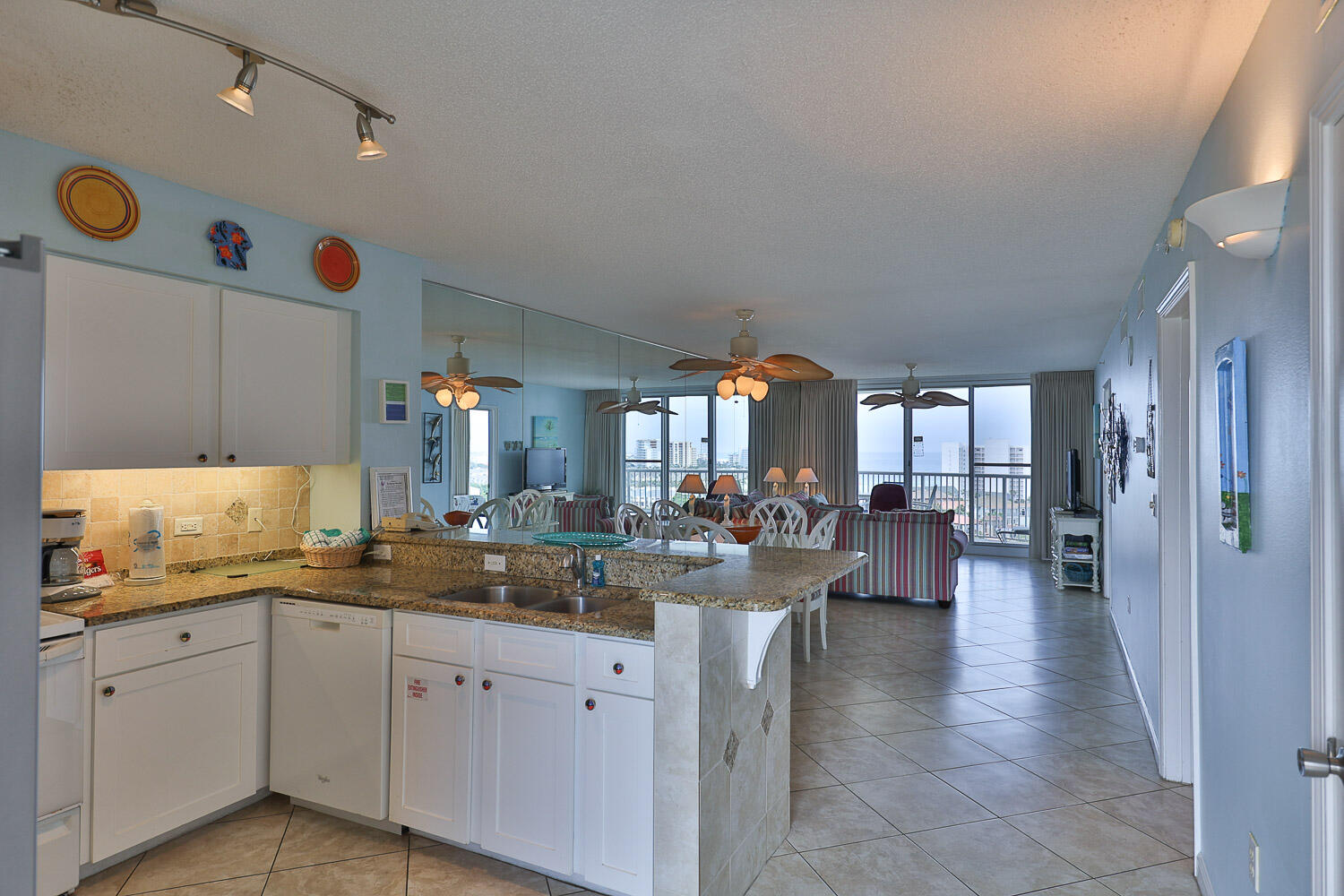 This 10th floor Terrace condo offers unparalleled views of the Destin Sunsets. The W/D is 2 years old, and dishwasher is 1 year old. You have a direct access to the beach. There is an exercise room and pool on site, but you also have access to all the Pelican Beach Resort amenities, including Pickle Ball, Sauna and Steam room, an electric car charger with an onsite tiki bar and cafe, which you rarely find in a condo complex Condo includes undercover parking # 24 and this complex is close to so many activities and restaurants. With judicial use this condo should produce around $45-50,000 annually. There is 24-hour security on the premises. Quote from rental manager: I think with the right updates I could get $40k-50k.