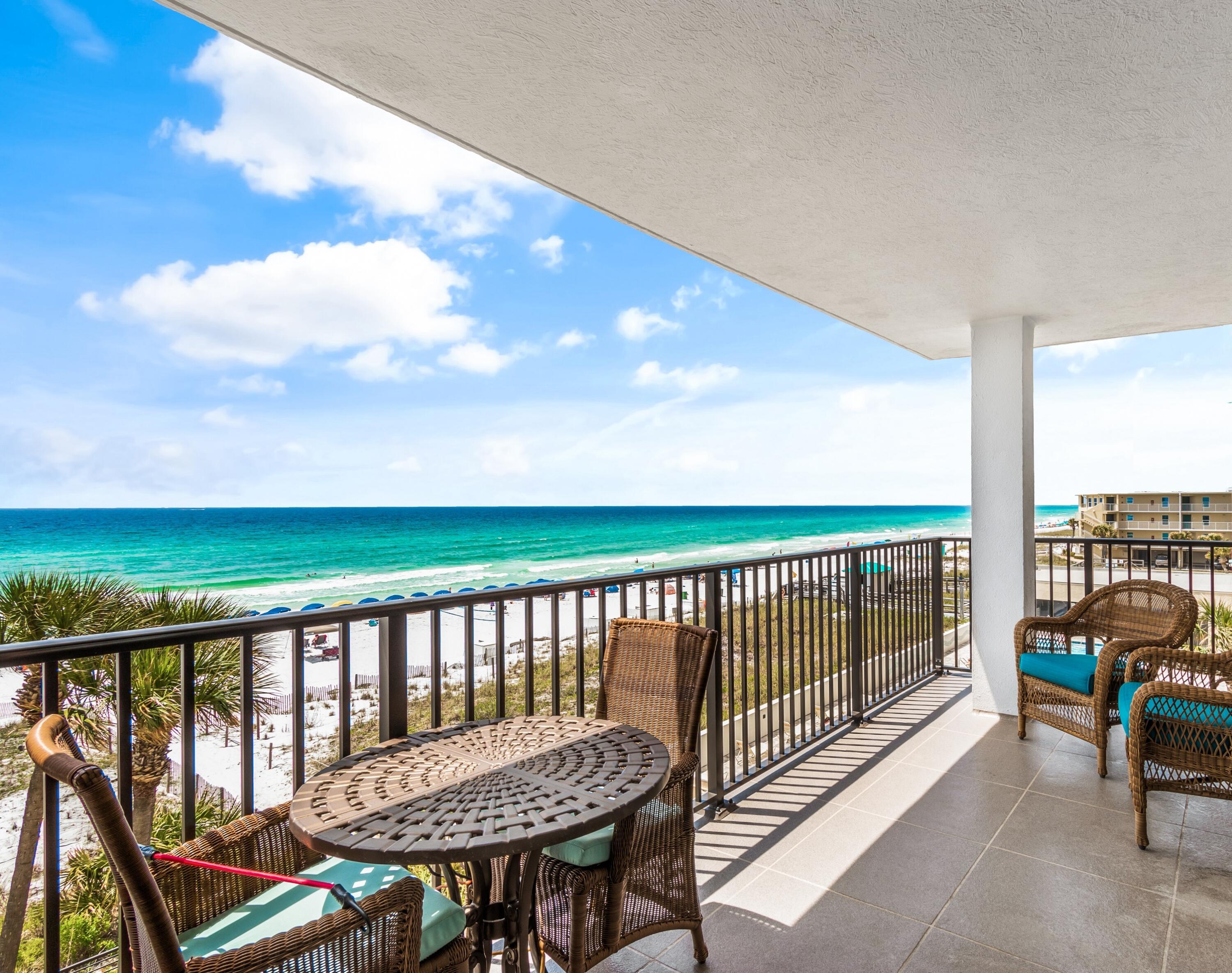 Price Improvement! $100k reduction!This Highly Sought after Gulf Front unit at Emerald Towers offers South and West views of the crystal-clear water and white sandy beach.Upon entering this unit, the open concept welcomes you. This gorgeous 3 bedroom, 3 bath condo is offered Fully Furnished. The beautiful spacious kitchen features high-end stainless-steel appliances including a built-in ice maker and stunning countertops. The laundry room has a full-size Frigidaire washer, dryer and storage for your convenience. The living area offers a stunning view of the Gulf of Mexico. The living/dining area is expansive! The color palette and light custom draperies provide a pure sense of relaxation. Enjoy the covered balcony accessible from the living room and primary bedroom.More . .