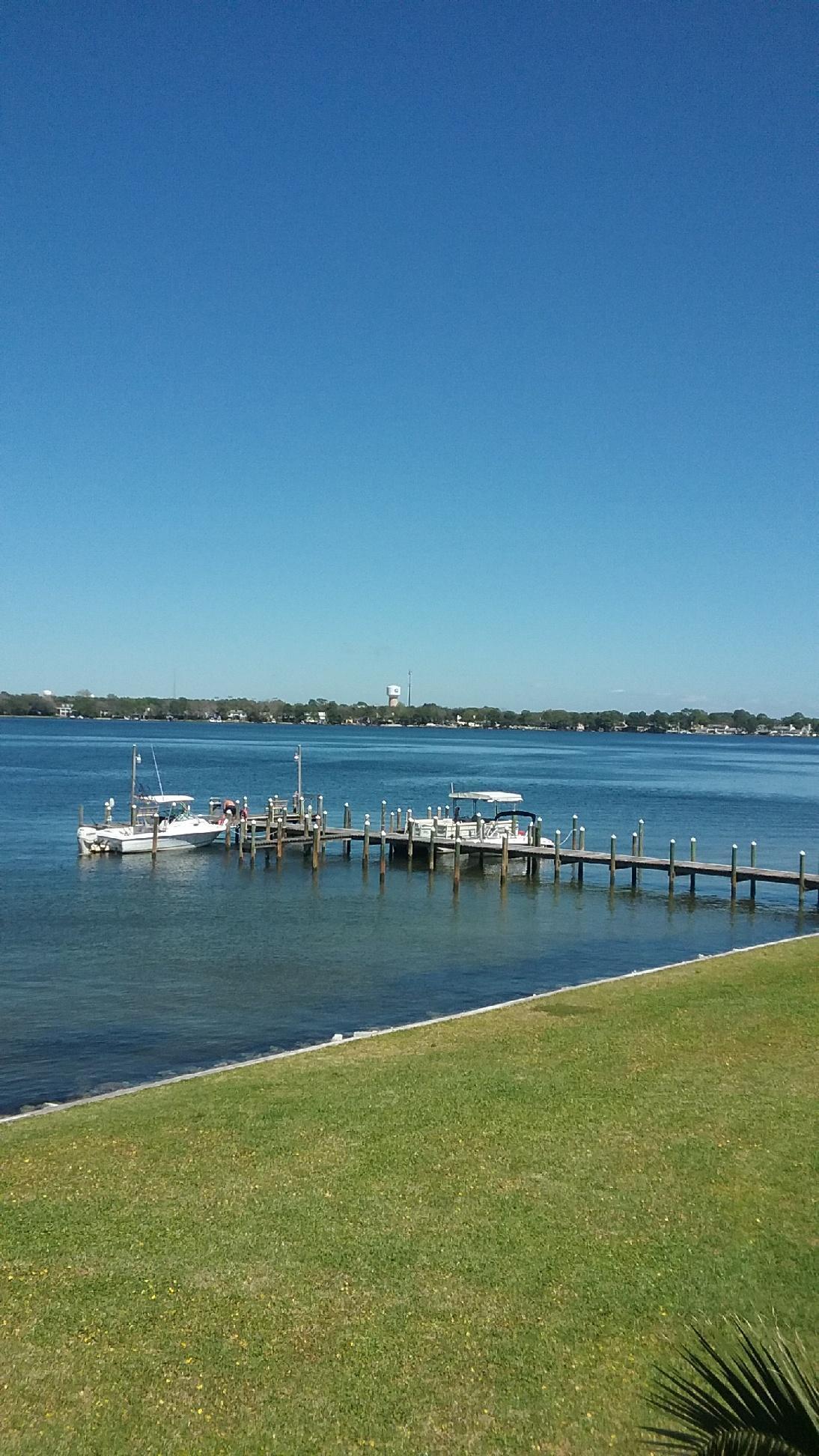 Welcome home to Bayview Waters! This unit is on the second floor with 3 bedrooms and 1 bath with gorgeous views of the bay! Boat slips are available. Other amenities include laundry facility, pool, grill stations, and a dock. This is a very well kept condo and at a killer price! This one wont last long!