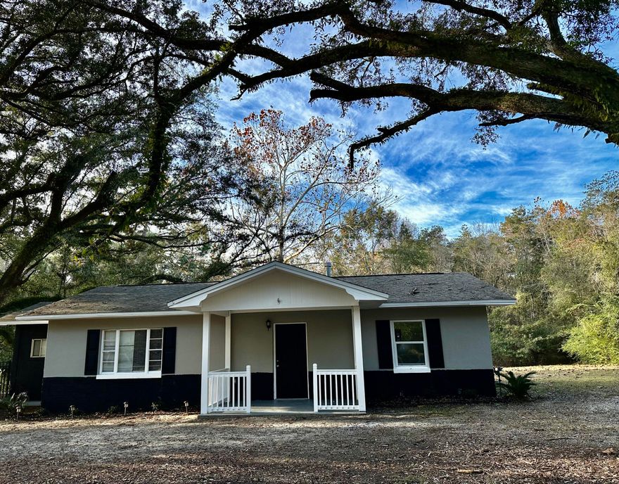 REO. RECENTLY RENOVATED home sitting on 2.4 ACRES in the Heart of Crestview! Charming 3 Bedroom 1 Bath home with a Large Eat in kitchen and Huge Living Area!  INTERIOR AND EXTERIOR FRESHLY PAINTED.  NEW LVP FLOORING IN LIVING AREAS!  Covered front Porch. Large stately Oaks grace the property.  Rare opportunity for Acreage close to the City Center.  Newer Roof that is only 4 years old. Call for more information!