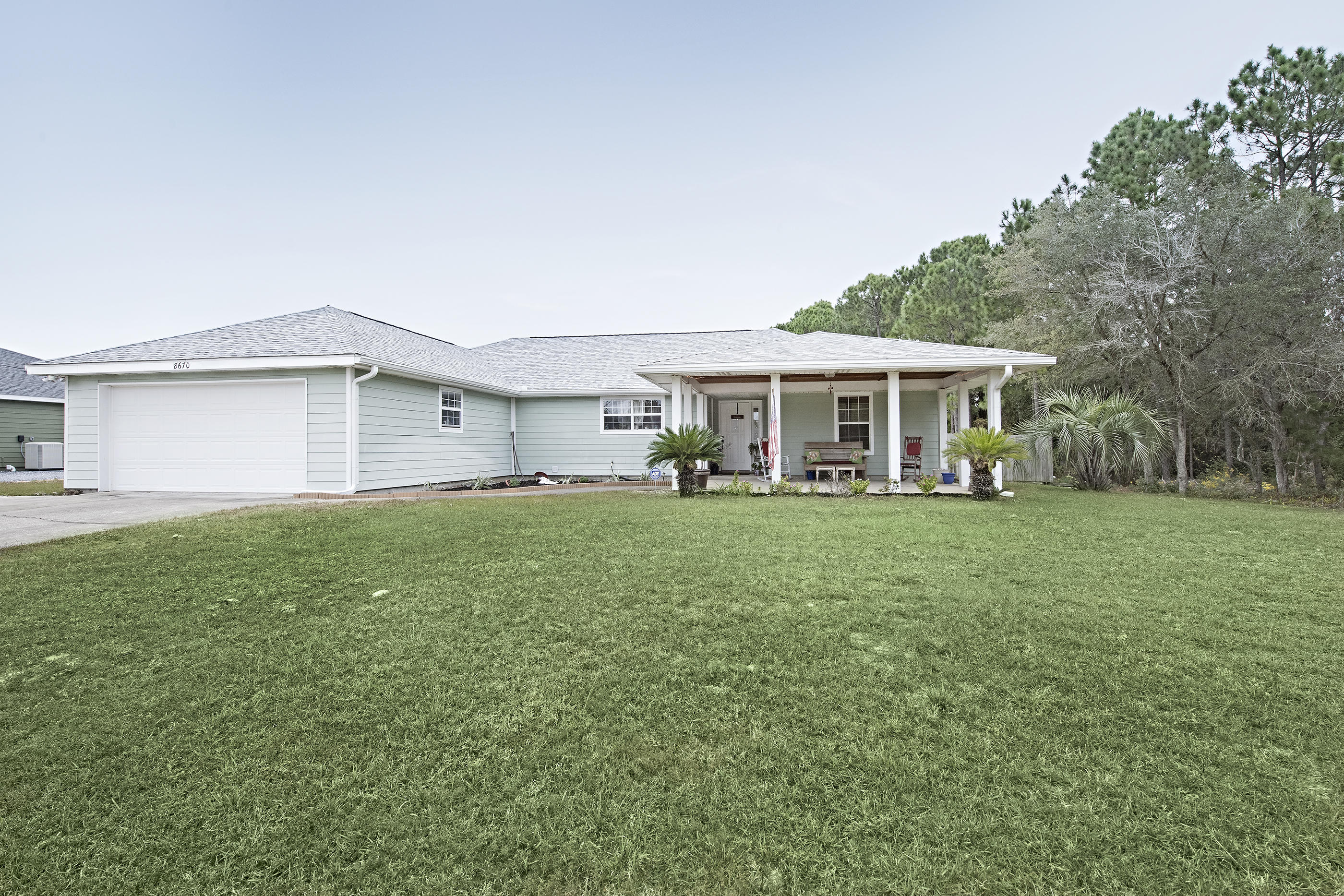 Welcome Home! This adorable ranch style home is an entertainers paradise. Expansive living/dining room combo. Large eat in kitchen with plenty of storage and stainless appliance package. Exceptional Master Suite has plenty of room for both king bed and a sitting area. Bedroom also features his and hers walk- in closet. The huge walk in shower features cultured marble shower and double shower heads. Backyard has a luxurious salt water heated pool and a lighted pergola. All doors and windows that lead to pool have alarm for safety. Upgrades include include: new roof, fresh paint though-out, privacy fences, new water heater, garage door and opener. Home is a 5 minute drive from the sugar white sand beach of Navarre! Call today to schedule a private showing!