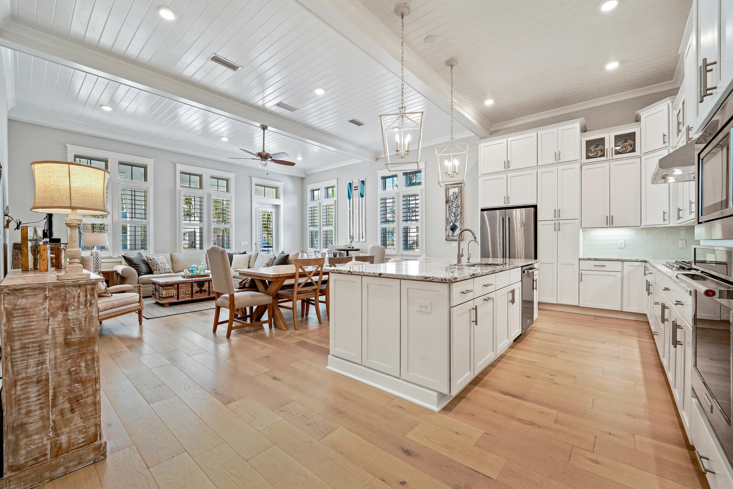 SELLER OFFERING $50,000 INCENTIVE TO BUY DOWN INTEREST RATE, PAY CLOSING COSTS OR TO PURCHASE A WATERSOUND (BEACH AND GOLF) CLUB MEMBERSHIP.Offered Turnkey | Gulf views of amazing sunsets | Six-seater golf cart | Fenced in backyard | Whole home generator | Members-only gate access to the WaterSound Club, at the end of the street.This meticulously cared for, never been rented home is ideally located on the south side of 30A between Seagrove and Alys Beach and adjacent to the WaterSound Club. With strong rental projections, this home is an ideal perfect second home or investment property. Upon entry, you experience the open floorplan flooded with natural light and professionally decorated with high end neutral coastal finishes. The most desired Laguna floor plan features 12-foot tongue and groove ceilings, wood floors, tiled bathrooms, stone countertops, upgraded lighting and shiplap accent walls throughout. The living space incorporates a chef's kitchen with an oversized island, and a spacious dining and great room. The first level is complete with a master suite, powder room, walk- in pantry, and an oversized garage with built in storage.
The home sleeps ten and includes two master suites, one on the main level and one on the second level, each with private covered porch access. The other two bedrooms, located on the second floor, also have private bathrooms and share a covered porch with Gulf views to enjoy spectacular sunsets. The second floor is complete with the laundry room and an additional living area with a queen sofa sleeper and two chairs.
Owners enjoy the many neighborhood amenities within Prominence including two resort style pools (one is heated), a fitness center and seasonal shuttle service to the newly renovated Deer Lake Park Beach Access. Located within walking distance to the 'Big Chill', aka 'The Hub', enjoy several restaurants, shopping, an amphitheater with a covered event pavilion, a cinema screen for movies and sports as well as a stage for concerts and events.