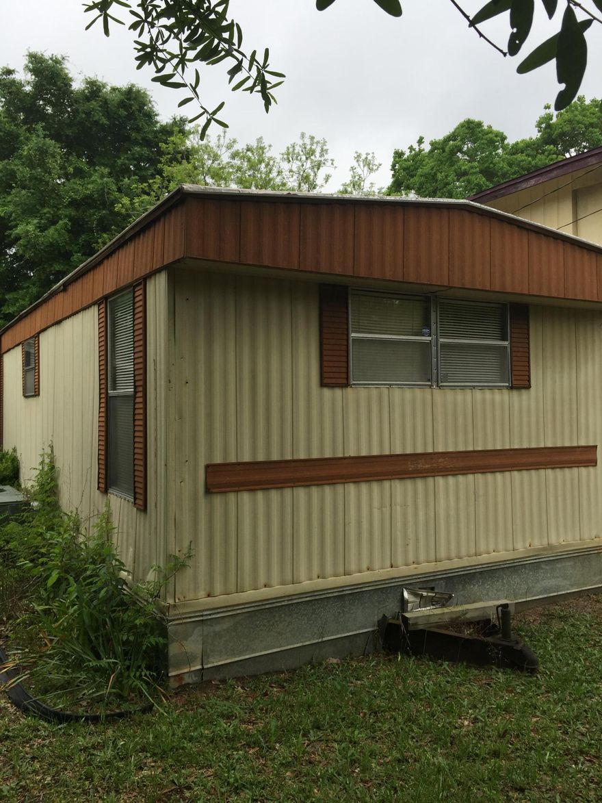 Nice yard and landscaping on this mobile home lot. Mobile home is a 14 X 66 3 bed 2 bath, sold as-is. Adjacent lot has a 26 X 22 two story barn. MLS 727167. Gleen Place is close to bases, shopping , medical care.