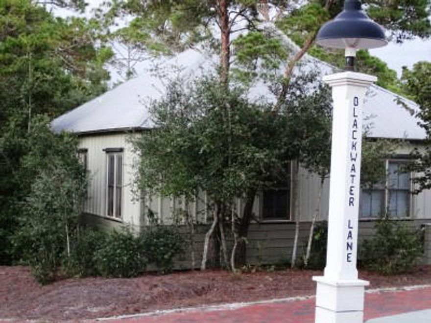 Fantastic beach home ''Coastal Dream'' located in Magnolia Cottages by the Sea - a popular community located on the Scenic Hwy 30A in Seacrest. Fully furnished and completely refurnished interior in 2013. Great investment property with $30K +/- in gross rental income for 2014. Deeded beach access and community pool! This charming cottage is beautifully decorated, has a fantastic, well-equipped kitchen, oak stained hardwood flooring, laundry room, owner's locker and secluded screened-in rear porch that backs to a private wooded setting. New HVAC unit, new screens, exterior repainted, and closed cell foam insulation blown in sub-floor in 2012. Hurricane shutters for all windows, convenient keyless entry and large outside storage shed. Interior completely refurnished in 2013.