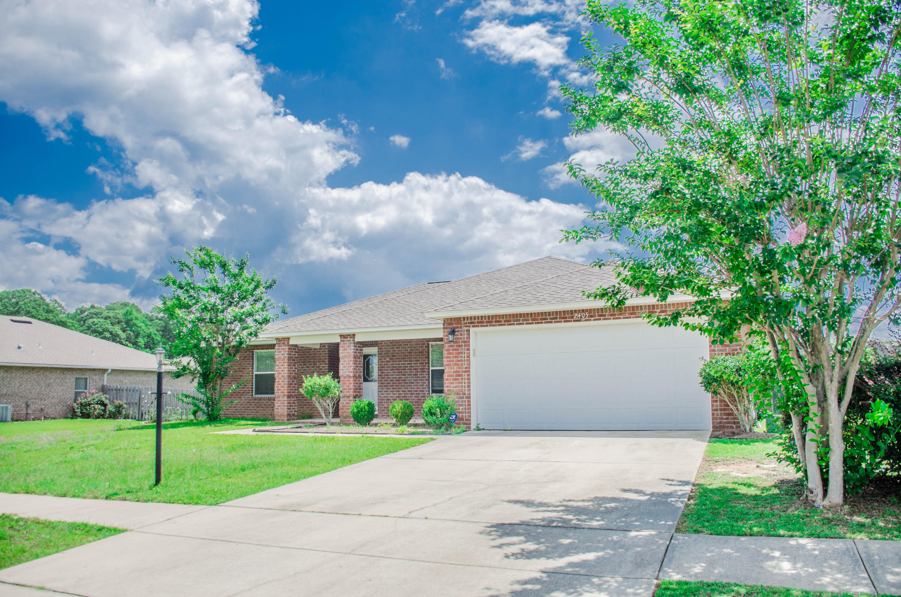 Great subdivision with sidewalks, street lights and underground utilities. Lovely open concept floor plan with a study/office, large, eat-in kitchen with breakfast bar, wide pantry and opens to the spacious family room. Family room provides plenty of room for entertaining guests. Sliding glass doors lead out to a screened in porch. Back yard is amazing. Fenced-in level 1/2 acre which allows plenty of room for the kids and Fido to play. Outdoor shed to store all your gardening tools. Popular split bedroom floor plan. Master bathroom includes a separate shower and tub. Large walk-in closet and double vanity sinks. Additional bedrooms share a bathroom with a shower/tub combination. Home has recently been professionally cleaned, including carpets. Just waiting for a new owner