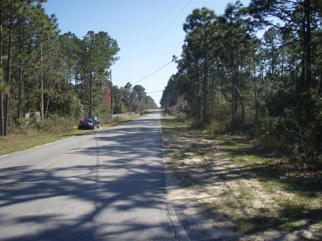 N 99.18' of S 198.36' of E2 of NE4 of SE4 of NW4 of NE4 as des in OR 1852 pg 891 Less E 33' for RD - Land