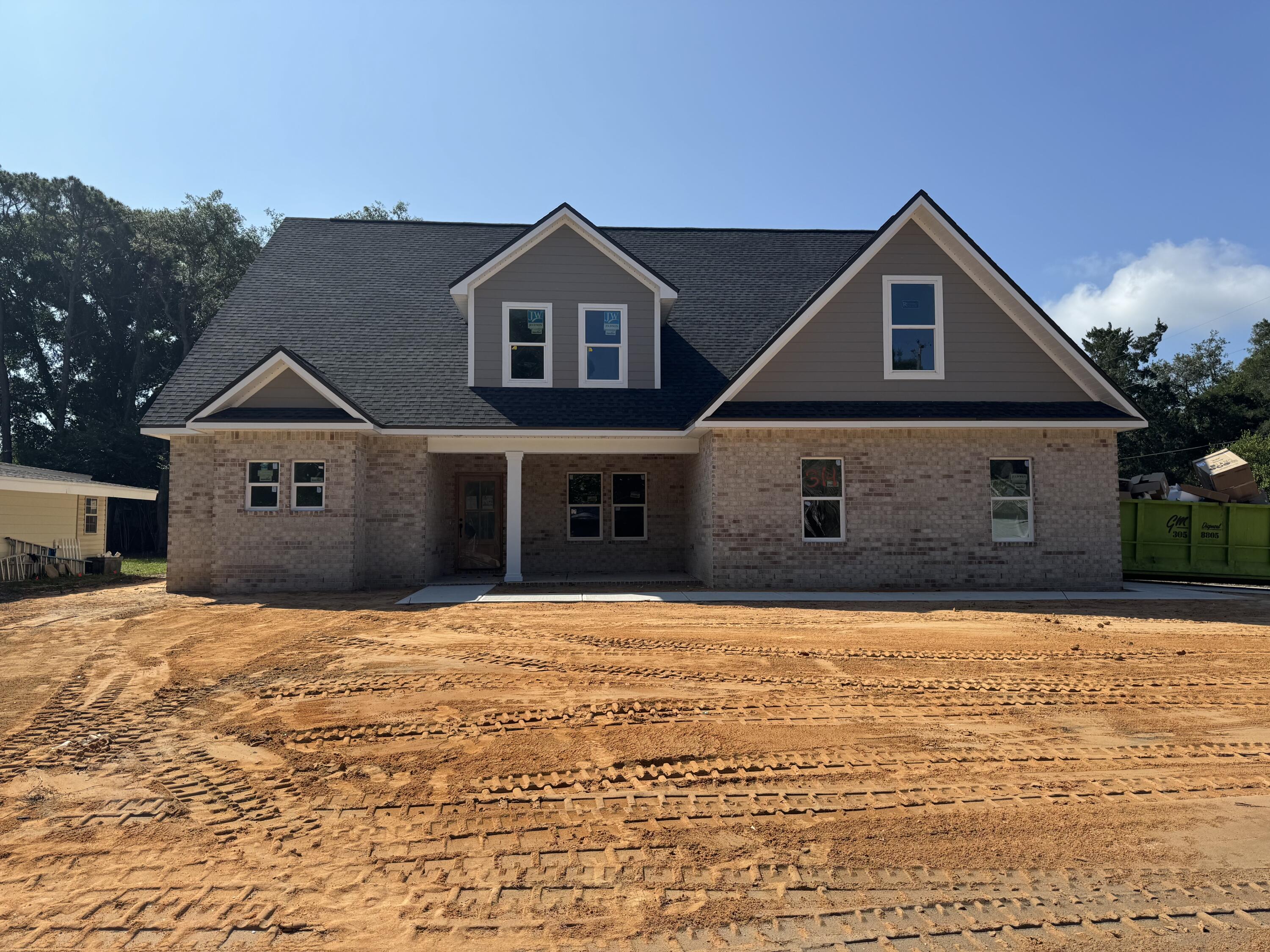 Currently under construction & will be completed June 2025. This beauty is located in the highly desirable Elliott Point neighborhood of Downtown Fort Walton Beach, this brand new 2025 home by Grand American Homes offers over 3,060 square feet of thoughtfully designed living space with 6 bedrooms, 3 bathrooms, and upscale finishes throughout.This two-story home offers a main floor master bedroom and 2nd bedroom with a full bathroom, a formal dining room and breakfast nook. The designer-like kitchen offers soft close cabinets, a built in pantry, quartz countertops and a tiled backsplash. The true star of the show is the gas fireplace that will be the centerpiece of your living space, with marble tile, a cypress mantel and shiplap detail it makes a perfect gathering place for all occasions.
On the 2nd floor you will find a loft space perfect for a small home office and 4 additional large bedrooms! This home also includes 2 laundry rooms! No more lugging clothes up and down the stairs!
Some additional features of this home include LVP/Tile flooring throughout, Crown molding, solid pine baseboards, gas package to include gas furnace, range, dryer, fireplace, grill stub out and tankless water heater.
Located within walking, biking, or golf cart distance to local shops, restaurants, pickleball courts, the yacht club, public boat launch, and neighborhood water access, this home places you in the heart of Fort Walton Beach living. With the beach just under 2 miles away, and Eglin AFB and Hurlburt Field both less than 5 miles, the location couldn't be more ideal.
Don't miss this opportunity to secure your place in one of Fort Walton Beach's most sought-after neighborhoods. Contact us today to learn more about the amazing builder incentives and make this home yours before completion!