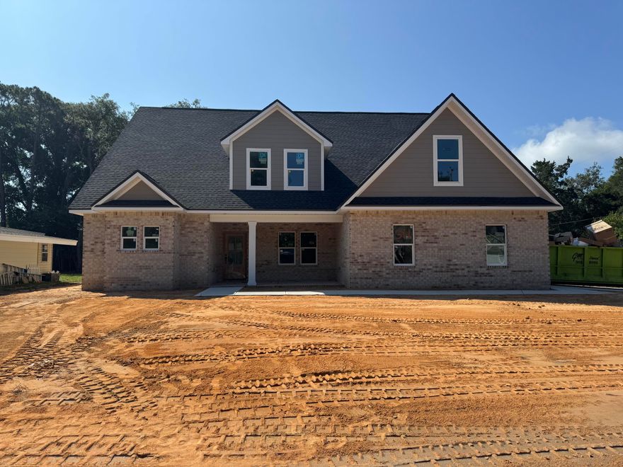 Currently under construction & will be completed June 2025. This beauty is located in the highly desirable Elliott Point neighborhood of Downtown Fort Walton Beach, this brand new 2025 home by Grand American Homes offers over 3,060 square feet of thoughtfully designed living space with 6 bedrooms, 3 bathrooms, and upscale finishes throughout.This two-story home offers a main floor master bedroom and 2nd bedroom with a full bathroom, a formal dining room and breakfast nook. The designer-like kitchen offers soft close cabinets, a built in pantry, quartz countertops and a tiled backsplash. The true star of the show is the gas fireplace that will be the centerpiece of your living space, with marble tile, a cypress mantel and shiplap detail it makes a perfect gathering place for all occasions. 

On the 2nd floor you will find a loft space perfect for a small home office and 4 additional large bedrooms! This home also includes 2 laundry rooms! No more lugging clothes up and down the stairs! 

Some additional features of this home include LVP/Tile flooring throughout, Crown molding, solid pine baseboards, gas package to include gas furnace, range, dryer, fireplace, grill stub out and tankless water heater. 

Located within walking, biking, or golf cart distance to local shops, restaurants, pickleball courts, the yacht club, public boat launch, and neighborhood water access, this home places you in the heart of Fort Walton Beach living. With the beach just under 2 miles away, and Eglin AFB and Hurlburt Field both less than 5 miles, the location couldn't be more ideal.

Don't miss this opportunity to secure your place in one of Fort Walton Beach's most sought-after neighborhoods. Contact us today to learn more about the amazing builder incentives and make this home yours before completion!


