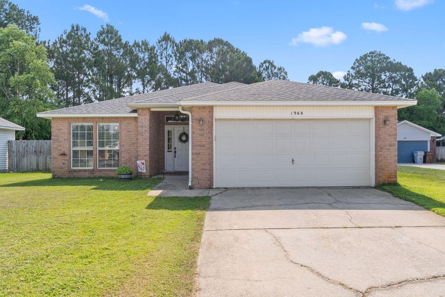 Welcome Home! This charming 3 bed, 2 bath, 2-car garage home in the Midway part of Gulf Breeze located in Hidden Shores offers 1857 sqft of comfort. Enjoy an open floor plan, vaulted ceilings, and a cozy fireplace. The kitchen is a chef's dream with custom cabinets, granite countertops, tile backsplash, stainless steel appliances, and a wrap-around breakfast bar. Both the roof and water heater were replaced in 2021. Remodeled guest bath features a cultured marble shower/tub. Master suite boasts dual sinks, garden tub, separate shower, and a huge closet. Guest bedrooms have professionally shelved closets. Laundry room has custom cabinets. Relax on your covered patio in the large, privacy-fenced yard. This neighborhood also features underground utilities.  Don't miss this complete package!