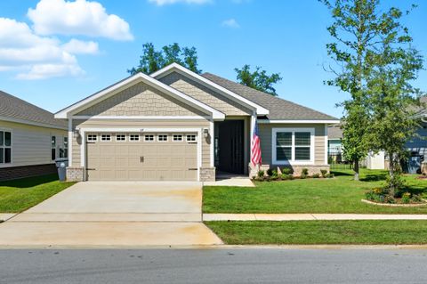 Photo of 49 Cool Breeze Drive, Freeport, FL 32439 (MLS # 987394) Photo of 49 Cool Breeze Drive, Freeport, FL 32439 (MLS # 987394)