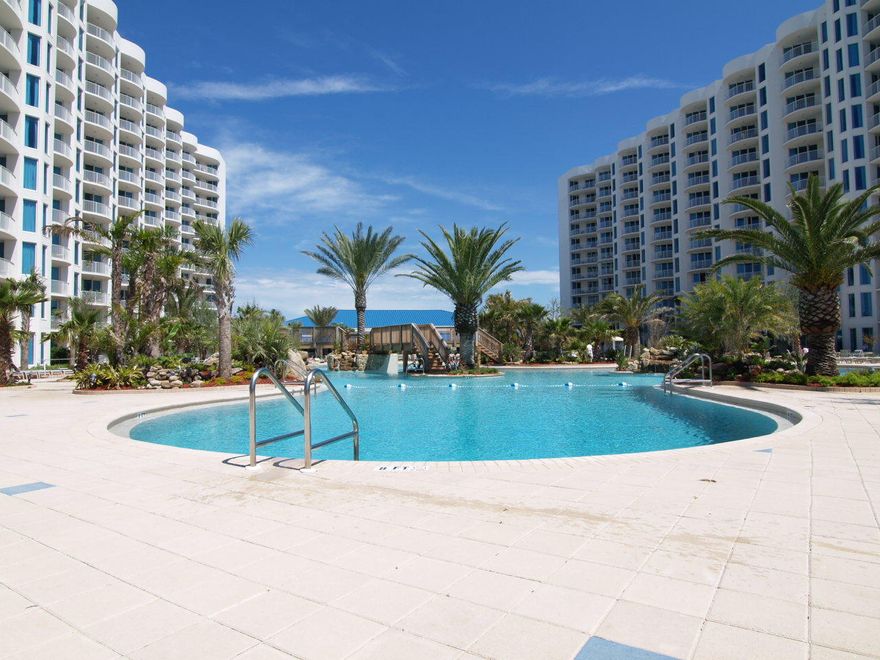Courtyard unit with great views at the Palms of Destin Resort & Conference Center. This 2-bedroom / 2-bath suite offers both a living area and master bedroom overlooking the pool& palm trees. Its large balcony offers an accommodating perch from which to relax and enjoy the best of Destin. This unit's modern open-air design offers contemporary comfort amidst upscale furnishings. Interior design includes granite countertops, tile flooring in the kitchen & both baths, and carpeted living, dining, and bedroom areas. Amenities include an expansive lagoon pool, spas, a children's pool, restaurant and lounge with covered outdoor seating, conference and wedding facilities, a luxury spa, fitness/cardio center, lighted tennis courts, basketball court, jogging trail, playground, outdoor music and Mo