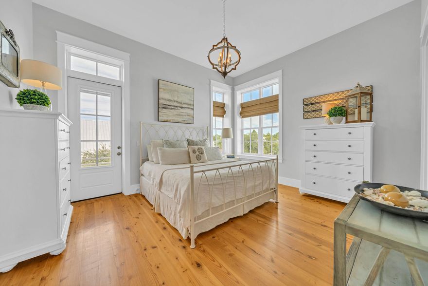 This Craftsman Style Beach House features 3 large, with 2 of them being Master bedrooms, all with en suite bathrooms and balconies. The Master bedrooms have walk-in closets and large showers. The upstairs Master has a gorgeous garden tub. This home is constructed with Interlocking Concrete Forms (ICF) which makes it energy efficient and sturdy in Florida storms. With this home having a reversed floor plan-it allows for an open concept kitchen, dining and living space. A large private balcony off the back of the home looks onto a densely forested property and Cypress Dunes community famed 100+ year old Cypress pond. You will find nature at its best as you will see deer, raccoon, and fox pass through behind the house. The kitchen boasts an expansive island area with seating, a walk-in pantry, and a bar area with a built-in wine refrigerator. The kitchen has a Bosch refrigerator. The den has 15' vaulted ceilings. Transom windows on the 2nd floor allow for sunlight to flood this home.
An oversized one car garage allows for storage and a workbench area. There is also a decked in crawl space underneath the home for storage. Beautiful landscaping with flowering plants greet you as you drive up.
This home is completely updated form inside to out. Updated paint inside and outside, countertops, backsplash, faucets, and lighting. The unique Cypress wood floors are displayed throughout the house.
You need to see this home to take in all of the features and updates. This home comes mostly furnished with many pieces from Pottery Barn and local businesses. 65" Samsung TV with Bose speaker system stays with the home.