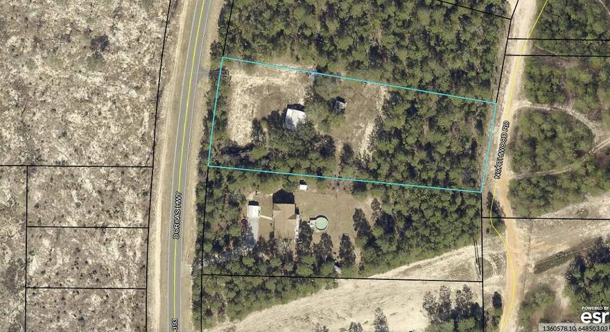 Take a look at this 2 plus acres to possibly build your dream home or investment property. This lot does have an old mobile home on it that is typically a shell at this point that can be torn down or removed. This property has access from Hwy. 393 as well as another road that runs along the back side called Northwood Drive. This huge piece of land is ideal for someone wanting to build a modern 3 or 4 BR home with that extra space for a backyard oasis and then some. There is new construction being built all around this location, which makes this a great opportunity to own over 2 acres and build to suit. You will have to see this amazing piece of land to appreciate it. Go take a look!