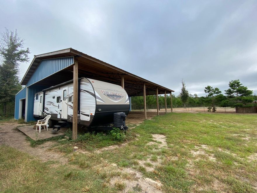 30x50 Barn with a 20x50 enclosed wing, water and power in place! Bring your RV and your future home plans! This lot is mostly cleared. This is a 4.4 AC portion of parcel ID 15-2N-26-0000-00206-0000. Other lots available. Exact lot size and location to be determined by survey.