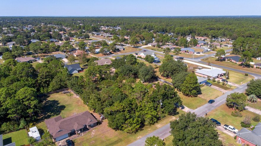 Vacant lot located in the desirable neighborhood of Holley By The Sea.  Build your dream home and enjoy all the community amenities that are offered with residency in one of the largest residential communities in Navarre.  Located within a great school district and minutes away from the beautiful beaches of the Emerald Coast, shopping, and restaurants.