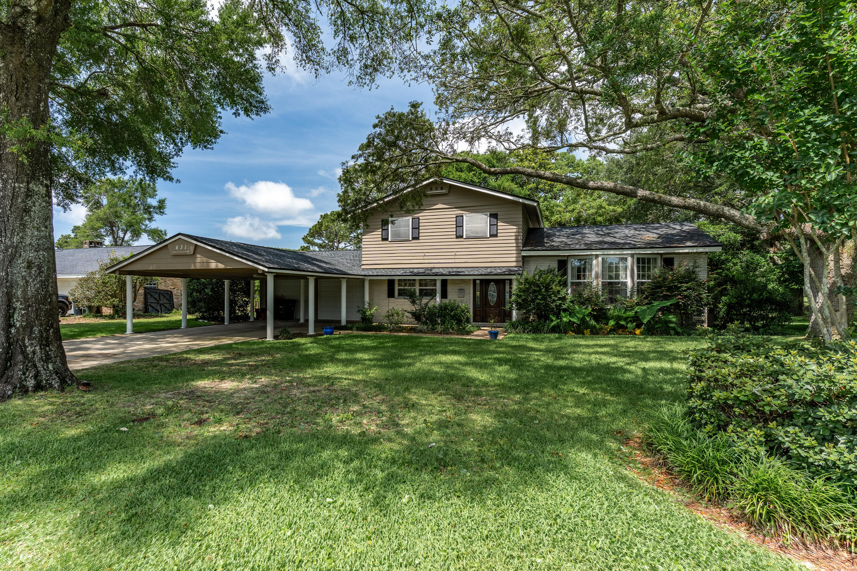 Make an Offer! Own a golf course home near Kenwood Elementary with space, character, and freshly painted plus new floors. Start living your dream in this renovated home on the 8th fairway of the FWB Golf Course. Renovated interior, Roof 2024, HVAC in 2023, Exterior paint 2023 & lawn pump, 2013 H2O Heater. Enjoy views of the fairway from your expansive backyard and covered patio or relax on the large upstairs balcony located off the spacious master bedroom. Inside the split-level layout with a grand entryway, 2 living areas, 4 bed/2.5 bath, a bright white kitchen with granite countertops, stainless appliances, an open dining area, and tons of storage. The property features a 2-car garage plus 2-car carport, offering room for vehicles, golf carts, and storage.