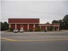 LOCATED ACROSS FROM DEFUNIAK SPRINGS AIRPORT. 200 LINEAR FT OF FRONTAGE ON HWY 90. THIS BUILDING IS IN THE PERFECT LOCATION FOR THE NEW AIRPORT EXPANSION PROJECT. MULTI-FUNCTIONAL BUILDING WITH OFFICE/WAREHOUSE/STORAGE AREAS (INTERNAL AND EXTERNAL). BUILDING IS STEEL FRAME WITH STUCCO FINISHES. THIS PROPERTY IS SITUATED ON 2.89 ACRES. Owner is willing to consider partial owner financing.