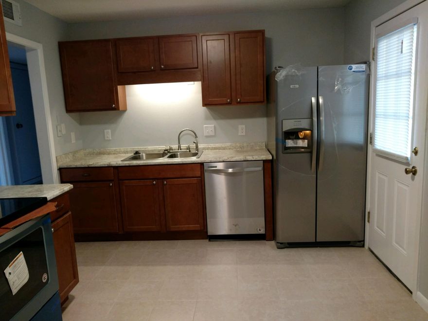 Taking back ups. Buyer is not ready to close on cash deal which now has a contingency.....Four bedrooms plus a family room! Quiet location at the end of the cul de sac. This home has been completely renovated! All new cabinets, counters and stainless appliances. All new flooring throughout..... Tile and laminate. Freshly painted and all new fans and lights. New toilets and vanities. New garage door. All new blinds. Copper wiring recently installed.