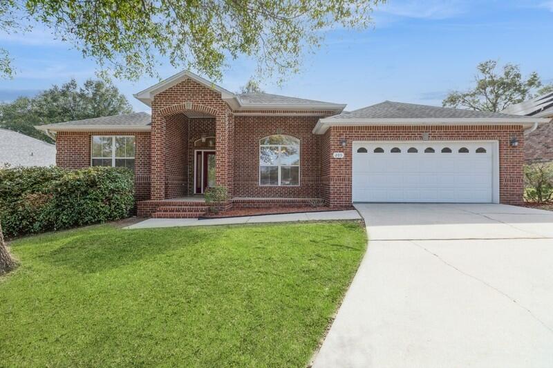3.125% Interest Rate VA Assumable with Veteran United. This stunning contemporary-style home features 5 spacious bedrooms and 3 full bathrooms. The master suite includes crown molding, high ceilings, two large walk-in closets, a whirlpool tub, standing shower, double vanity, and a toilet nook. New carpet throughout the home, including the master bedroom, complements the fresh paint. The kitchen boasts granite countertops, stainless steel appliances, recessed lighting, and double pantries. The home also offers a walk-in laundry room, Spanish tile in wet areas, new window screens, blinds, dishwasher, and microwave. Enjoy a treehouse in the backyard, perfect for imaginative play. A two-car garage with storage completes this home, with a brand-new mailbox and potential for a lush lawn.