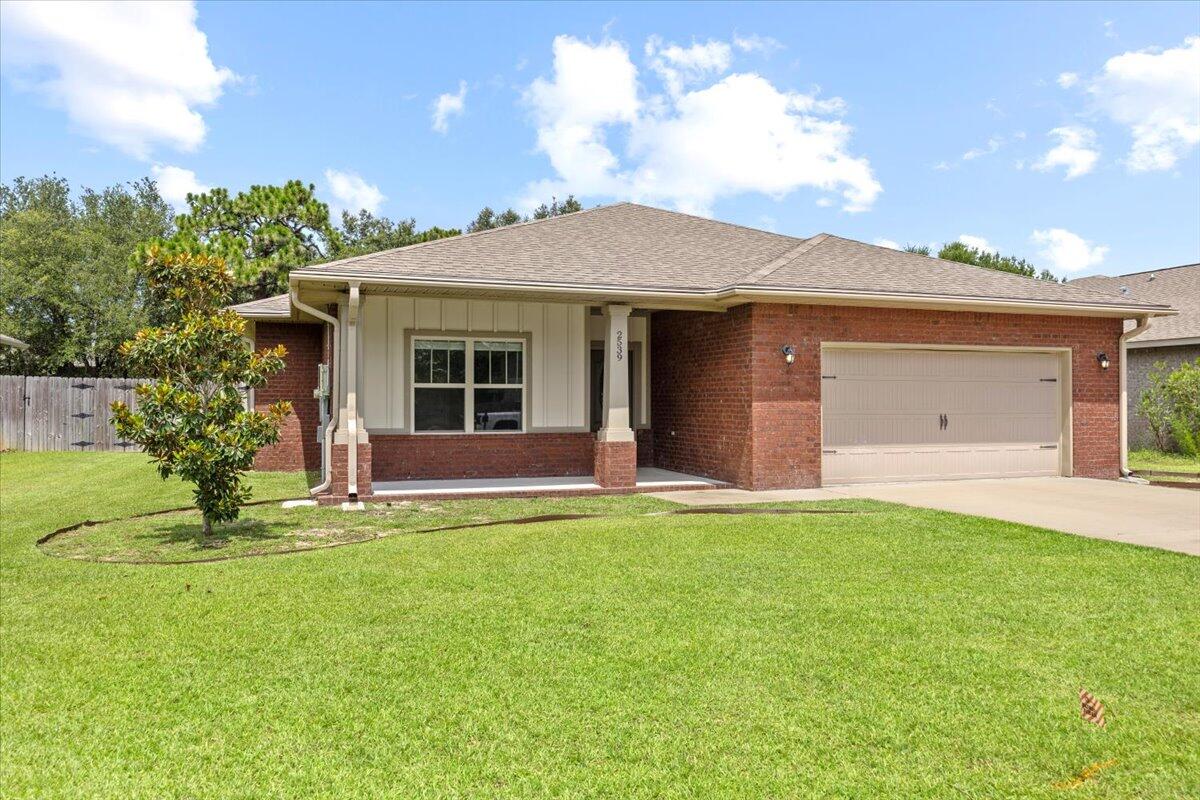 Welcome to this beautiful custom home in a quiet cul-de-sac in the Pebble Brook neighborhood! Prime location located 5 miles to Navarre Beach, 10 miles to Hurlburt Field, and walking distance to Navarre High School! The open split layout features stunning double vaulted tray ceilings in the living room, kitchen, and master bedroom, giving the home a generous and airy feel. The master bathroom is a true retreat, has a built-in walk-in custom closet, large 30-square-foot tiled walk-in shower and garden tub, perfect for relaxing! Bright and inviting, the home features expansive windows that flood each room with an abundance of natural light. Bedrooms are all carpeted and spacious, with generous closet space. Outside enjoy a private fenced yard with plenty of room to entertain!