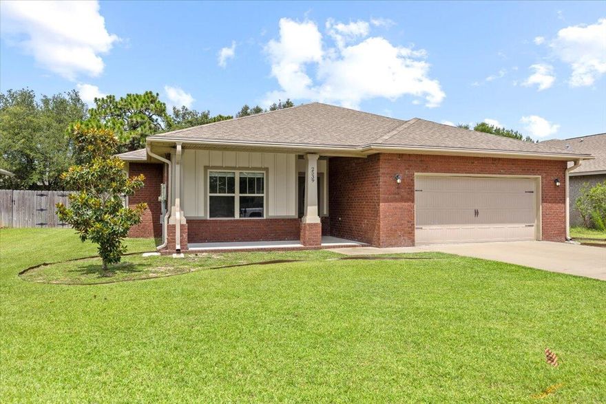 Welcome to this beautiful custom home in a quiet cul-de-sac in the Pebble Brook neighborhood!  NO HOA!!!! Prime location located 5 miles to Navarre Beach, 10 miles to Hurlburt Field, and walking distance to Navarre High School! The open split layout features stunning double vaulted tray ceilings in the living room, kitchen, and master bedroom, giving the home a generous and airy feel. The master bathroom is a true retreat, has a built-in walk-in custom closet, large 30-square-foot tiled walk-in shower and garden tub, perfect for relaxing! Bright and inviting, the home features expansive windows that flood each room with an abundance of natural light. Bedrooms are all carpeted and spacious, with generous closet space. Outside enjoy a private fenced yard with plenty of room to entertain!