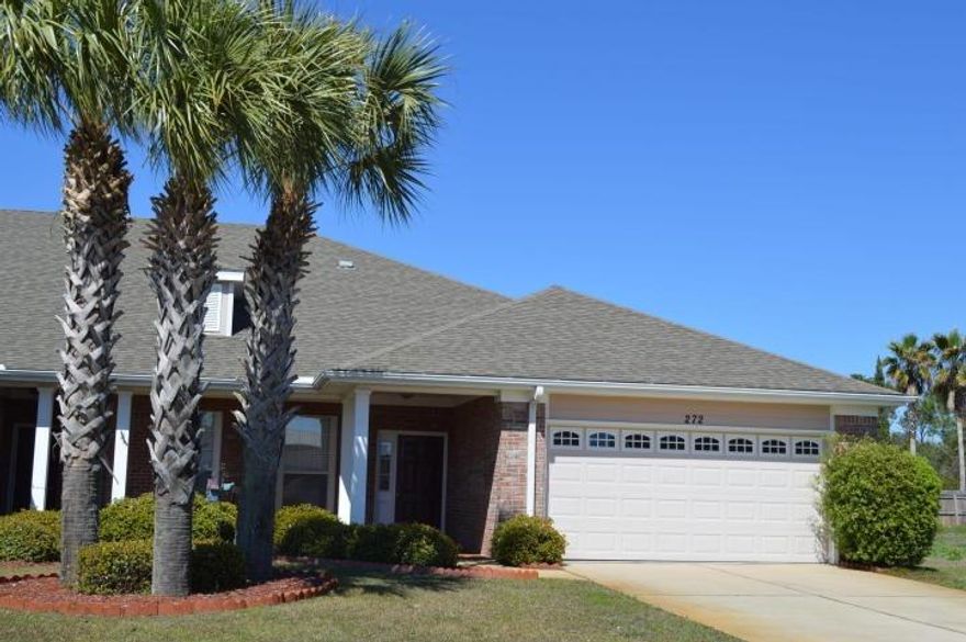 This spacious townhome is located in the sought after community of Diamond Lakes. Close to shopping, schools, dining and the Destin Harbor. This three bedroom, two bath brick home has a two car garage, open floor plan and split bedrooms. Interior features are a gas fireplace with built in shelving, vaulted ceilings, tile and wood flooring throughout. Master bedroom has a garden tub and walk in shower. The kitchen has stainless steel appliances and large bar that overlooks the main living area. Diamond Lakes has a community pool, walking path and lawn and roof maintenance provided by the HOA.