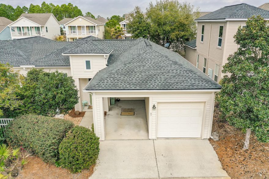 Courtyards of Santa Rosa Beach is a highly sought after gated rental restricted neighborhood! This home with one car garage and carport, features 2 Bedrooms, 2 baths with master suite and guest bedroom all on a single level. This home is located just 1/4 mile from the Santa Rosa Golf & Beach Club and a quick 4 minute ride to the beach. This townhome is one of 11 single story homes. Ample living space with gas fireplace and an open area family room off of the formal living room. There is also an outdoor patio area for grilling and entertaining. The recently renovated bathroom feature beautiful quartz counter tops and tiled shower. A community pool and clubhouse is conveniently located. The upgrades and detail are far too many to mention. New roof and HVAC system installed in 2021