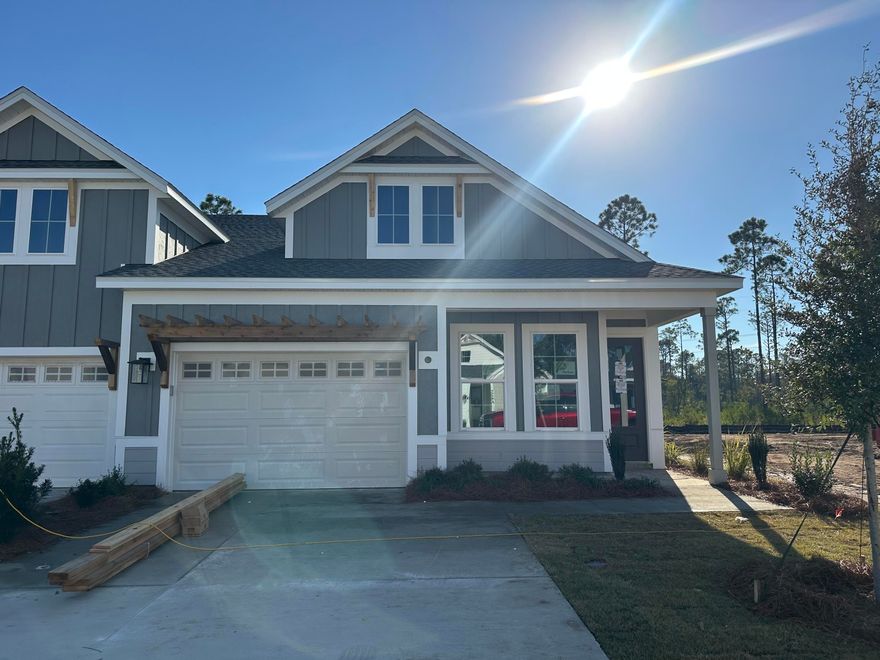 ** Seller closing cost incentive for this Market Home** Welcome to The Villas at Longleaf Park in the Watersound Origins community, offering stylish paired/attached villas by Fischer Homes. The LUCAS plan, a beautifully designed 2-bedroom, 2-bathroom single-level home, features 1,418 sq. ft. of effortless living space and a 1.5-car garage.Step inside to an inviting open-concept layout with a modern kitchen, spacious dining area, and a bright living room that seamlessly flows into a private covered patio, perfect for outdoor relaxation. The primary suite overlooks the backyard and boasts a spa-like ensuite bathroom with a double vanity and a generous walk-in closet.This homes includes abundant features and upgrades such as 10' ceilings, vinyl plank flooring throughout, upgraded countertops and more! See Designer selections (in Documents) chosen for this beautiful home! 

Enjoy the ease of a low-maintenance lifestyle, HOA membership covers lawn care and exterior home upkeep, giving you more time to enjoy the exclusive amenities Watersound Origins has to offer such as the Origins Golf Course, a resort-style pool, sports courts, and more.
This is your opportunity to embrace easy living in a vibrant, amenity-rich community. Schedule a tour today!

Estimated completion is Dec 2025.
