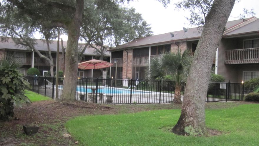 THIS IS A ONE-STORY CONDO AND FEATURES NEW ROOF, NEW FLOORING, NEW GRANITE COUNTER TOPS, NEW BACK SPLASH, NEWER WINDOWS,, NEW PAINT, NEW CEILING FANS, NEW BATHROOM TOILETS, NEW BATHROOM VANITIES AND MIRRORS, AND A ONE-YEAR HOME WARRANTY WITH ACCEPTABLE OFFER. Open concept, and the swimming pool (for residents only) outside your back door.  Also features full-size washer and dryer inside unit.  This is located on Carmel Drive, between WalMart and Lowes, and is convenient to both bases and the beaches.  Hurry, this won't last long.