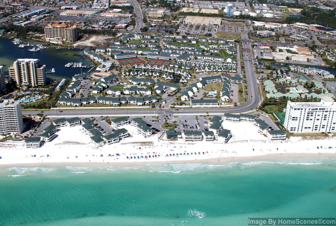 **Price Reduction** Owners say bring offer! Check out this 1st floor Updated 2 bedroom SPC Unit. Vinyl Plank flooring throughout, Neutral Paint, and nice Beachy furnishings. AC Replaced in 2018, New Hot Water heater in 2017. Renovated in 2017. Perfect Vacation home or rental investment. A Tennis Court view from the deck, and just a short walk to the amazing Louisiana Lagniappe Restaurant where you can enjoy a seafood dinner and sunset over the Destin Harbor. Sandpiper Cove truly has it all. 5 Community pools, 3 hot tubs, deeded beach access with a tiki bar to grab lunch or a refreshing beverage, tennis courts, shuffleboard, harbor access, oh and did I mention the Par 3 golf course? All without leaving the property.