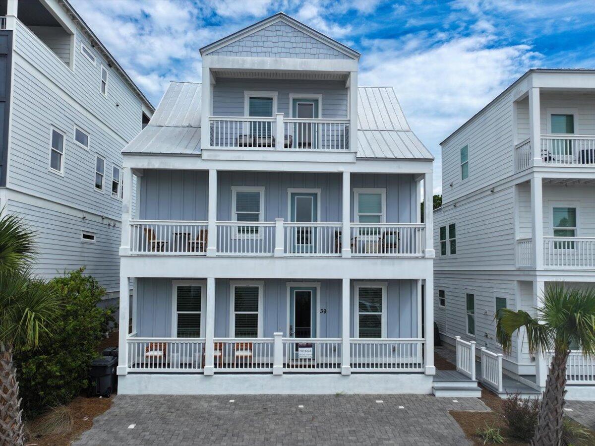 *OPEN HOUSE IN MODEL HOME LOCATED AT 415 DOLPHIN DR. SANTA ROSA BEACH: AUG 28TH-30TH, 11:00-4:00*Discover this beautiful 3-story beach home perfectly positioned in Serenity at Dune Allen, just steps from the sugar-white sands of the Emerald Coast. Backing up to a peaceful conservation area with no rear neighbors, this fully furnished and turnkey property is move-in and rental ready. High-quality furnishings, tasteful dA(c)cor, large flat-screen TVs, small appliances, and complete kitchenware are all included.The first-floor features soaring 10' ceilings, an open floor plan, a gourmet kitchen with quartz countertops, a spacious master suite, an additional half bath, and a large screened-in back porch. On the second floor, you'll find two bedrooms with king beds and two full bathrooms, plus two hallway bunk beds. The third floor offers a spacious loft with a bunk room (4 bunks) and a full bath. Every floor provides balcony access with tranquil views.
LVP and tile flooring throughout ensure both beauty and durability. Custom tile showers. The 3-car driveway allows ample parking for a golf cart and vehicles. With short-term rentals permitted, this property makes an excellent primary residence, second home, or income-producing investment.
Serenity at Dune Allen is located directly across from the Dune Allen Beach access and close to popular 30A dining, shopping, and entertainment.
