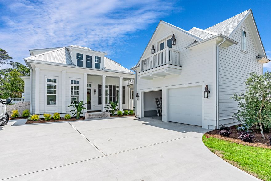 Back on Market due to buyer contingency falling through!! Step into unparalleled luxury in the heart of Watersound Origins with this stunning new construction, completed masterpiece home by Key Lime Construction, located in the highly anticipated Powell Landing East phase. Designed with the Fairweather floor plan, this home exemplifies refined modern living, combining elegance and comfort. This 3,343 square foot home features 4 bedrooms, 4.5 bathrooms, oversized driveway, plus an additional carriage house, providing a total of 5 bedrooms and 5.5 bathrooms.As you enter, you are immediately welcomed by the grand open-concept living space, bathed in natural light and centered around a cozy fireplace, perfect for both intimate evenings and grand gatherings. The seamless flow leads to a chef's dream kitchen, complete with high-end stainless steel appliances, sleek quartz countertops, and custom shaker-style soft-close cabinetry ideal for both culinary enthusiasts and casual entertainers.
The thoughtfully designed first floor boasts the luxurious primary suite and a second bedroom, offering ultimate convenience. The spa-like primary bathroom is your personal sanctuary, featuring a freestanding soaking tub, a separate walk-in shower, and exquisite tile finishes for a true retreat experience.
With 11-foot ceilings on the first floor and 10-foot ceilings on the second, the entire home radiates an open, airy ambiance that invites you to relax and unwind.
Outdoor living is elevated to resort-level luxury with your own private pool and spa, set against the backdrop of a screened-in porch with remote retractable screens, an outdoor kitchen, and a fireplace, perfect for alfresco dining or unwinding under the stars. Plus, direct access to a convenient poolside powder room ensures every detail is considered.
In addition to the main house, a beautifully designed carriage house above the detached two-car garage offers an extra bedroom and full bathroom, perfect for guests or a private home office. Whole House generator, upgraded lighting, and side brick courtyard are jut a few of many additional upgrades to make this home unique!
Living in the Watersound Origins community means enjoying world-class amenities right outside your door. The Village Commons offers a resort-style pool and fitness center, tennis and pickleball courts, miles of nature trails, and dock access to the stunning Lake Powell. For golf enthusiasts, unlimited golf awaits at the Origins Golf Club, while the expansive green spaces are perfect for outdoor play and relaxation. The brand-new Watersound Town Center enhances the lifestyle with a Publix Super Market, restaurants, healthcare facilities, and more.
Don't miss your chance to experience the ultimate Watersound Origins lifestyle. Schedule your visit today to explore this exceptional home where every detail has been crafted for your comfort and enjoyment.
*Prices include lot premiums and optional upgrades. Please contact the on-site community specialists for the latest information.**