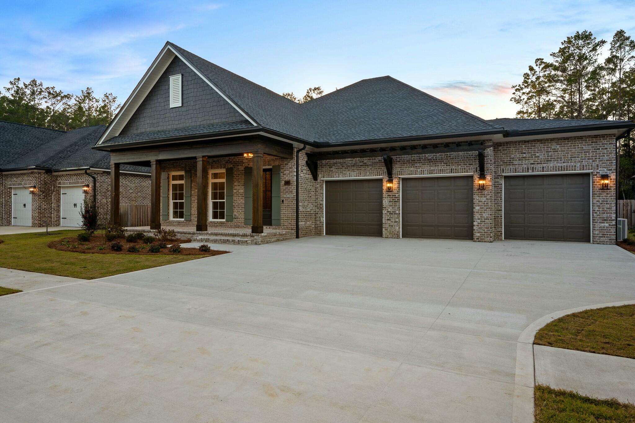 Beautiful new luxury home in Gated community of Reflection at Hammock Bay.  Generous outdoor living with grand front porch and very large rear porch fully screened with full summer kitchen, stained wood ceilings and brick floors.  Lush landscape front and rear yards.  Interior of the home features 10' ceilings with 8' solid core doors.  Crown moulding, base and cased windows throughout.  Wood floors throughout.  Custom tile work in bathrooms.  Dream kitchen!!  Featuring upgraded gourmet appliances - kitchen aid slide in stove, drawer microwave, oversized refrigerator.  Custom hood vent.  Large island.  Pocket office off master suite just the right size for private work area.  High end luxury finishes in every corner.  It's a must see for your clients.  Call Chad to set your appointment!!
