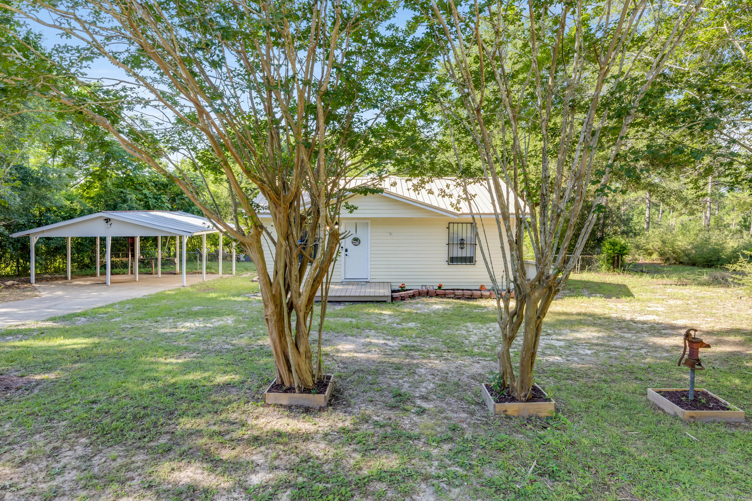 *OPEN HOUSE SUNDAY JUNE 29th 12-2* Don't miss out on this fantastic 3-bedroom 1-bathroom Florida Cottage on almost half an acre, ready for its new owners! This one has all the majors done for you including; Remodeled bathroom, kitchen, dining room, master bedroom, and closet. New flooring throughout the home, updated deck boards outside, & new dishwasher. Also, for a piece of mind the water heater is 2022, roof 2022, and hvac fall of 2023. Alot of the back yard has also been cleared. The location of this home is perfect, close to the new connector and the upcoming Pineview School K-8 being built. Solar cameras do not convey, but the ring cameras do.