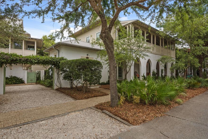 Conveniently located near the shops and restaurants of Rosemary Beach Town Center, lies this beautiful 4 bedroom, 4 bathroom family home. With over 2,500 sq. ft. of open living space, an expansive wrap around porch and balcony, and a charming private courtyard, this home is perfect for entertaining guests or enjoying time with your family. Warm wooden floors, stone counter tops and marble accents are found throughout this incredible property.Relax in your luxurious master suite with a large soaking tub, steam shower and double vanities. Enjoy the flow through French doors that open up to the private courtyard, and accommodate guests in the quaint separate carriage house over a 2 car garage.